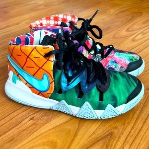 Kids Kyrie Basketball shoes size 2y. Multi colored. Used but in good condition.